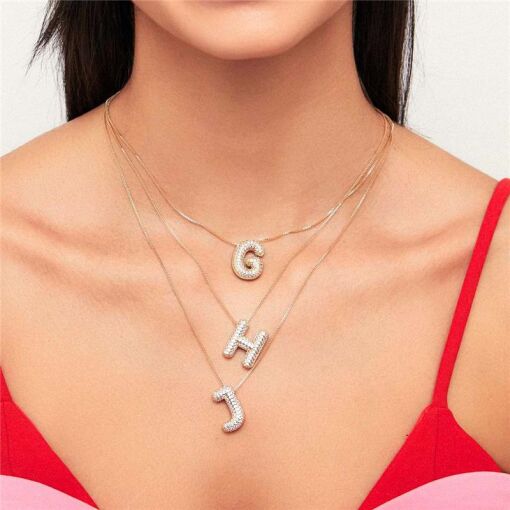 COLAR COM PINGENTE DE LETRA "H" CRAVEJADO BANHADO A OURO